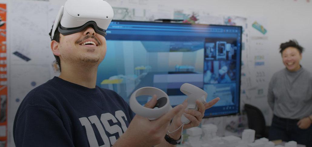 researcher uses a virtual reality headset