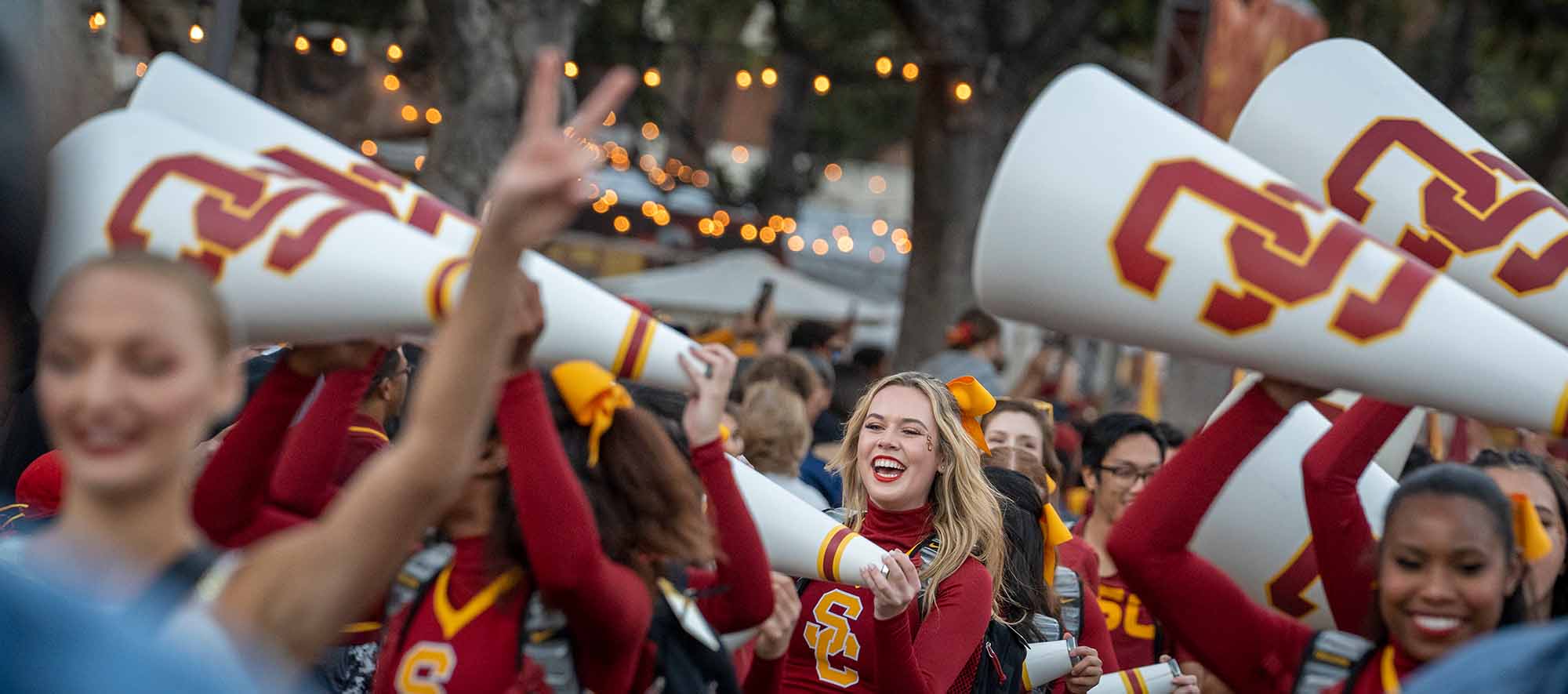 USC spirit leaders with enormous cones